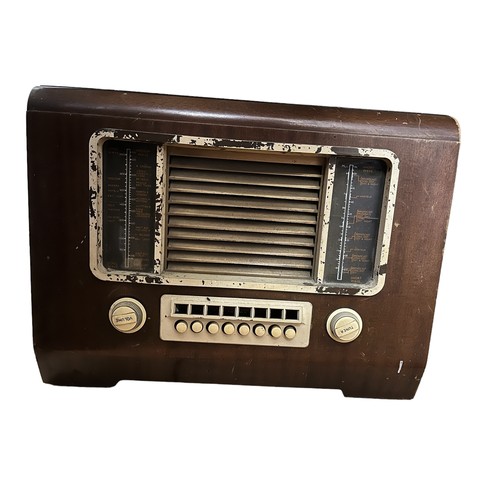 616 - 7 VINTAGE TIMBER CASED RADIOS by Bush, Philips and others .