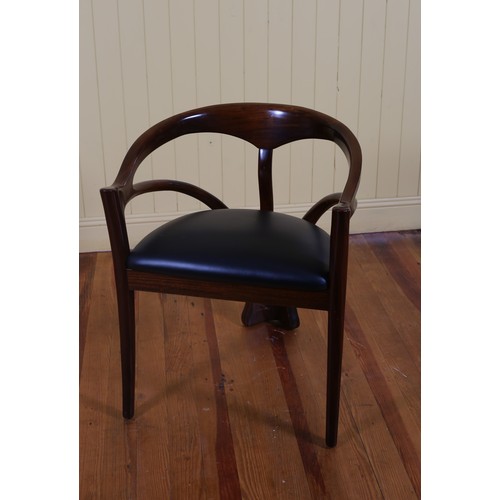 194 - AN ERIC CONNOR DESIGNER MAHOGANY TUB SHAPED CHAIR with upholstered seat on sabre legs