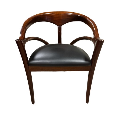 194 - AN ERIC CONNOR DESIGNER MAHOGANY TUB SHAPED CHAIR with upholstered seat on sabre legs