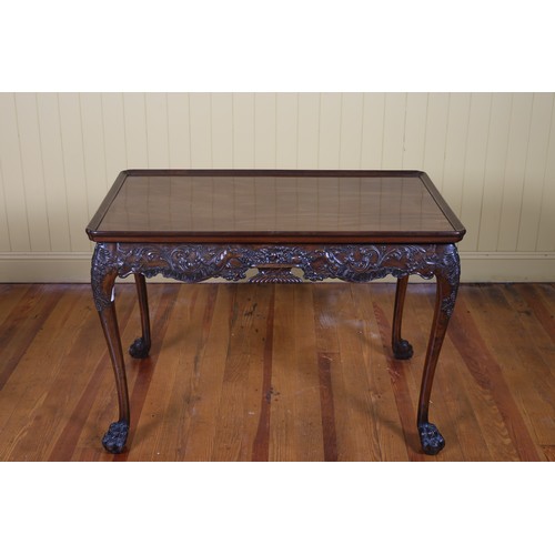 263 - A FINE 19TH CENTURY CARVED MAHOGANY SILVER TABLE the dish top above a carved apron on cabriole legs ... 