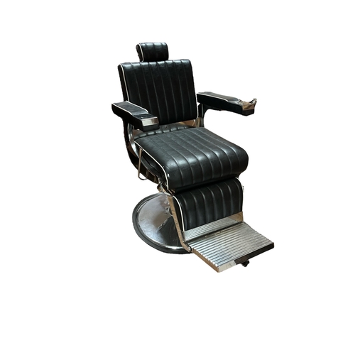 444 - A VINTAGE CHROME AND UPHOLSTERED ADJUSTABLE SWIVEL BARBERS CHAIR with footrest raised on a circular ... 