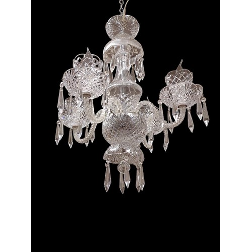 495 - A TARA CRYSTAL FOUR BRANCH CHANDELIER with spiral twist scroll arms hung with faceted pendants 60cm ... 