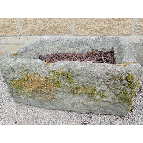 593 - A 19TH CENTURY GRANITE TROUGH of rectangular form 24cm (h) x 60cm (w) x 40cm (d)