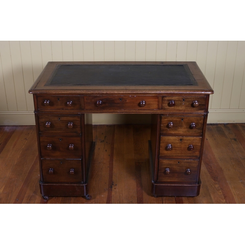 198 - A 19TH CENTURY MAHOGANY PEDESTAL DESK with tooled leather inset above three frieze drawers raised on... 