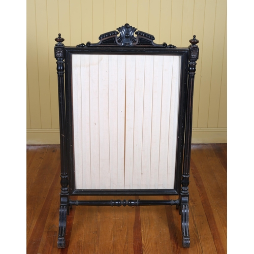 202 - A 19TH CENTURY CARVED EBONISED AND UPHOLSTERED FIRESCREEN with pleated panel on fluted tapering legs... 