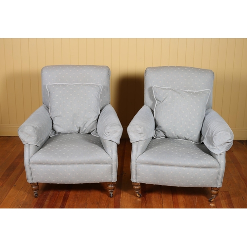 207 - A PAIR OF VICTORIAN STYLE UPHOLSTERED ARMCHAIRS each with a scroll over back and arms with loose cus... 