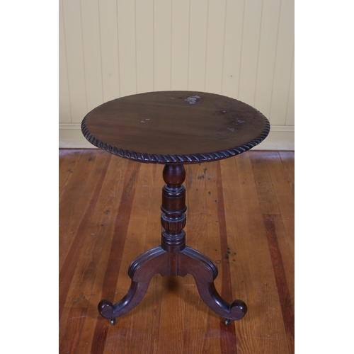 208 - A 19TH CENTURY CARVED MAHOGANY SNAP TOP OCCASIONAL TABLE the circular top above a baluster column on... 