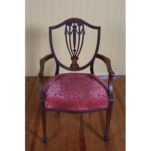 27 - A 19TH CENTURY HEPPLEWHITE STYLE MAHOGANY INLAID ELBOW CHAIR the shield shaped back with upholstered... 