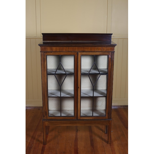 29 - A VINTAGE MAHOGANY TWO DOOR CHINA DISPLAY CABINET with astragal glazed doors on square moulded legs ... 