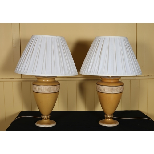 366 - A PAIR OF CONTINENTAL GLAZED TABLE LAMPS each of urn form the beige and topaz ground with circular s... 