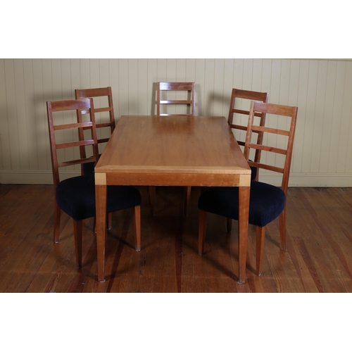 412 - A DUFF TISDALL CHERRYWOOD DINING ROOM SUITE comprising six dining chairs, including a pair of elbow ... 