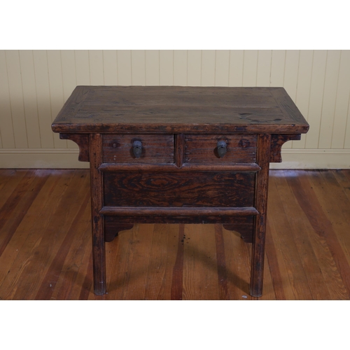 42 - AN ORIENTAL HARDWOOD SIDE TABLE of rectangular outline with two short drawers on moulded legs 81cm (... 