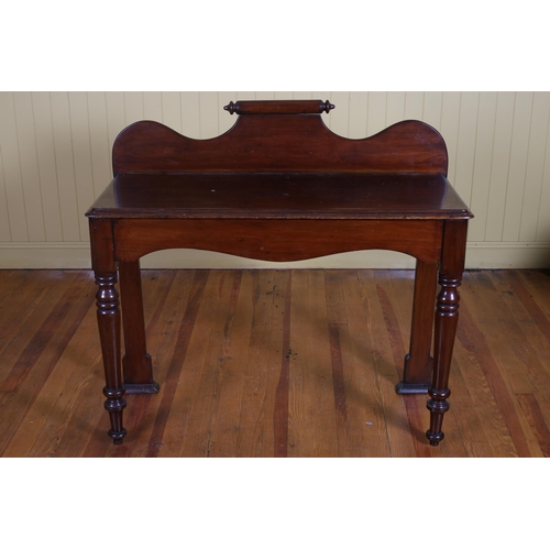 46 - A 19TH CENTURY MAHOGANY CONSOLE TABLE with moulded back above a shaped apron on baluster legs 105cm ... 