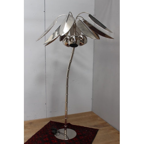 460 - A DESIGNER CHROME FLOOR STANDARD LAMP in the form of a palm tree with three downlighters raised on a... 