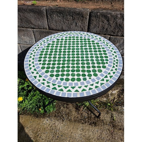 468 - A WROUGHT IRON AND MOSAIC TABLE of circular outline raised on tubular supports with splayed legs 72c... 