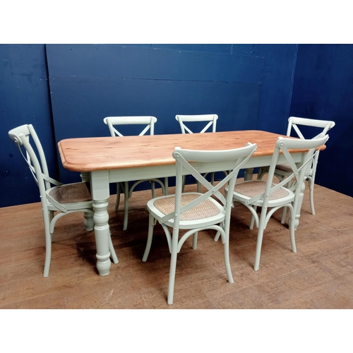 473 - A FARMHOUSE PINE AND PAINTED BREAKFAST SUITE comprising six chairs each with a curved top rail on an... 