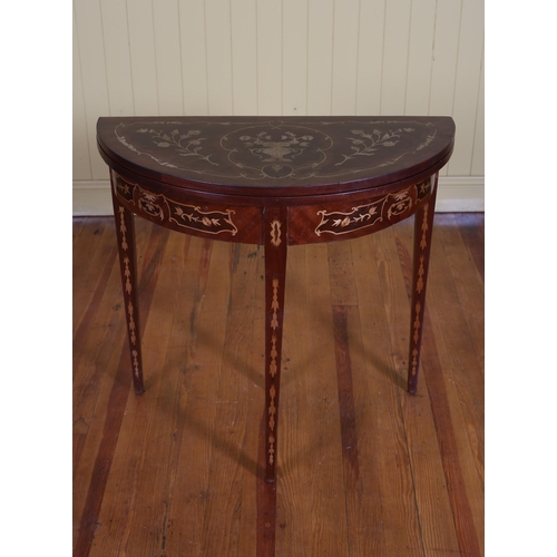 48 - A KINGWOOD AND MARQUETRY FOLDOVER CARD TABLE of demi lune outline on square tapering legs 81cm (h) x... 