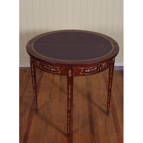 48 - A KINGWOOD AND MARQUETRY FOLDOVER CARD TABLE of demi lune outline on square tapering legs 81cm (h) x... 