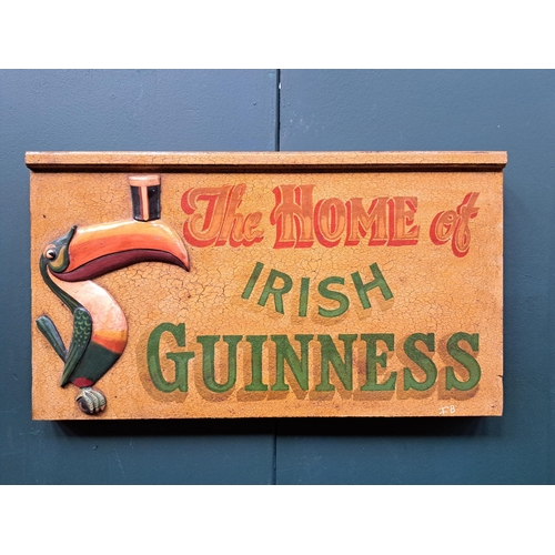 491 - A GUINNESS ADVERTISEMENT SIGN depicting a Toucan inscribed 'The Home of Irish Guinness' 43cm (h) x 7... 