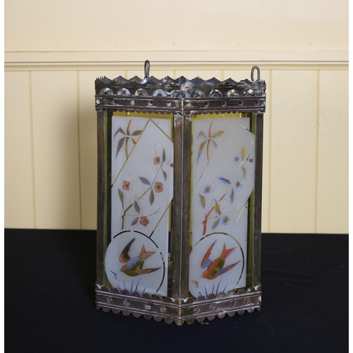 509 - A VINTAGE BRASS FROSTED GLASS AND PAINTED LANTERN of octagonal form (lacking one panel) 30cm (h)