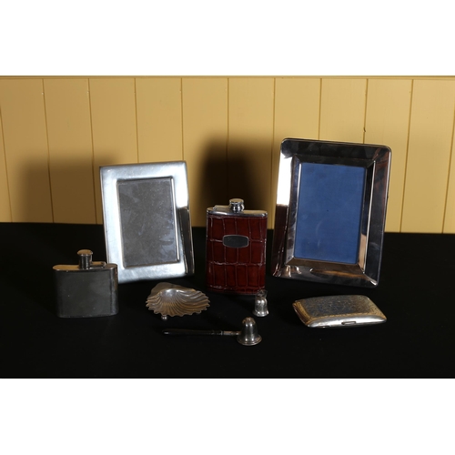 521 - A MISCELLANEOUS COLLECTION to include a silver cigarette case, a plated hip flask, two plated photo ... 