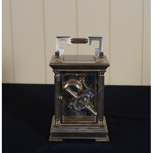 522 - A BRASS STRIKING CARRIAGE CLOCK the white enamel dial with Roman numerals inscribed 'West' 18cm (h) ... 