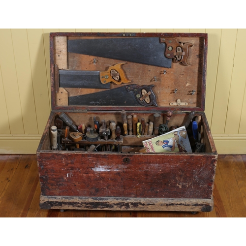 53 - A VINTAGE PINE WOODWORKER'S TRUNK the hinged lid containing a collection of various tools 46cm (h) x... 