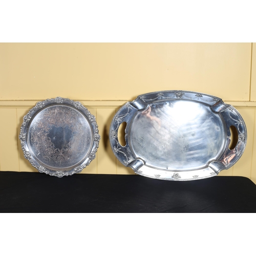 545 - A SILVER PLATED TWO HANDLED SERVING TRAY of oval outline together with A SHEFFIELD PLATED AND COPPER... 