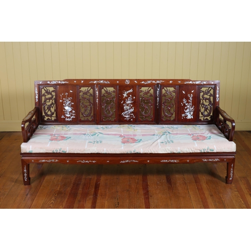 55 - A CHINESE ROSEWOOD AND MOTHER OF PEARL INLAID THREE PIECE SUITE comprising a settee, a pair of armch... 