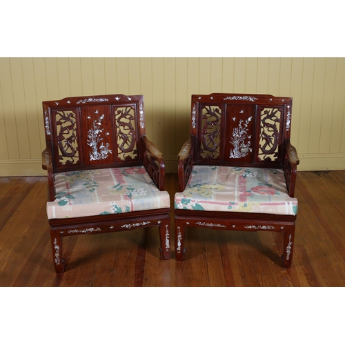 55 - A CHINESE ROSEWOOD AND MOTHER OF PEARL INLAID THREE PIECE SUITE comprising a settee, a pair of armch... 