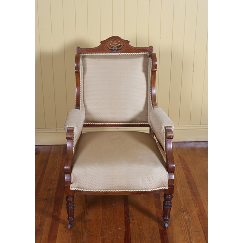 557 - AN EDWARDIAN MAHOGANY INLAID AND UPHOLSTERED WING CHAIR with upholstered panel seat and arm rests on... 