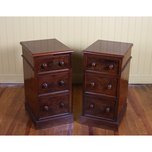 564 - A PAIR OF 19TH CENTURY MAHOGANY CHESTS each of rectangular outline containing three long graduated d... 