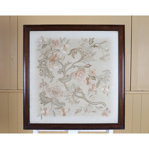 573 - A VINTAGE NEEDLEWORK PICTURE depicting flowerheads and foliage 56cm (h) x 55cm (w)