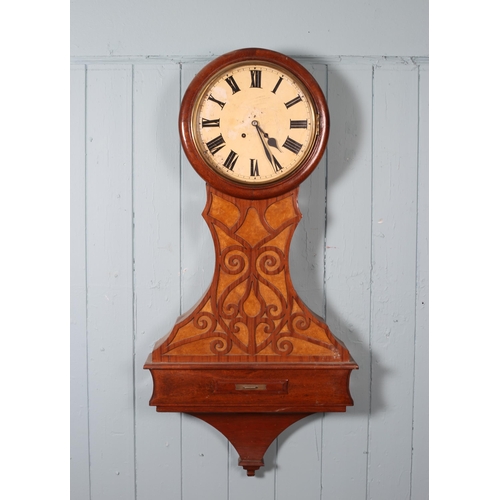 597 - A 19TH CENTURY MAHOGANY WALL CLOCK the circular painted dial with Roman numerals above a shaped case... 