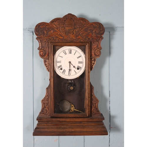 612 - EIGHT VINTAGE, AND LATER WALL CLOCKS to include two 'wagon on the wall' examples (8)