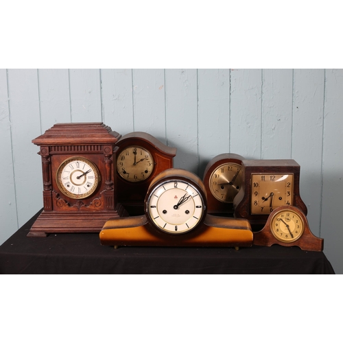 615 - A COLLECTION OF VARIOUS MANTEL CLOCKS to include one clock case (8)