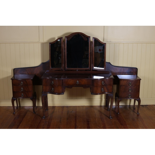 620 - A TWO PIECE MAHOGANY BEDROOM SUITE comprising a dressing chest with triptych swivel mirrors on cabri... 