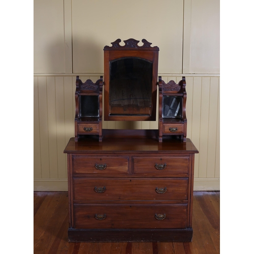 621 - AN EDWARDIAN WALNUT DRESSING CHEST the superstructure with bevelled glass swivel mirror above two sh... 