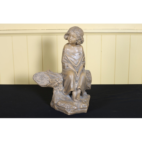 67 - A VINTAGE TERRACOTTA FIGURE modelled as a young girl shown seated on a rustic base 37cm (h)