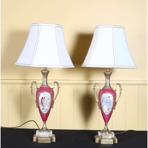 70 - A PAIR OF CONTINENTAL PORCELAIN GILT BRASS AND ONYX TABLE LAMPS each of vase form the turquoise and ... 