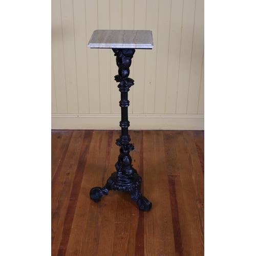 700 - A CAST IRON AND MARBLE STAND the square veined marble top above a ring turned column on triform base... 