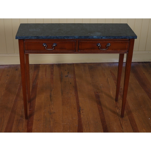 702 - A CHERRYWOOD OCCASIONAL TABLE surmounted by a green veined marble top above two frieze drawers on sq... 