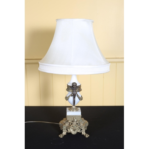 72 - A GILT BRASS AND WHITE MARBLE TABLE LAMP the urn column above a shaped base moulded in high relief w... 