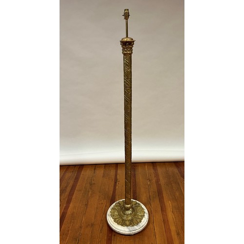 745 - A VINTAGE BRASS FLOOR STANDARD LAMP on a circular marble base 154cm (h)