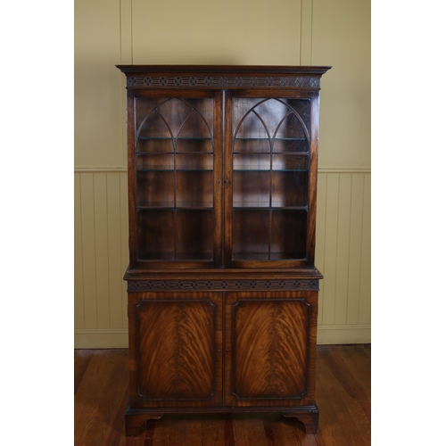 252 - A HEPPLEWHITE STYLE MAHOGANY DISPLAY CABINET the blind fret frieze above a pair of astragal glazed d... 