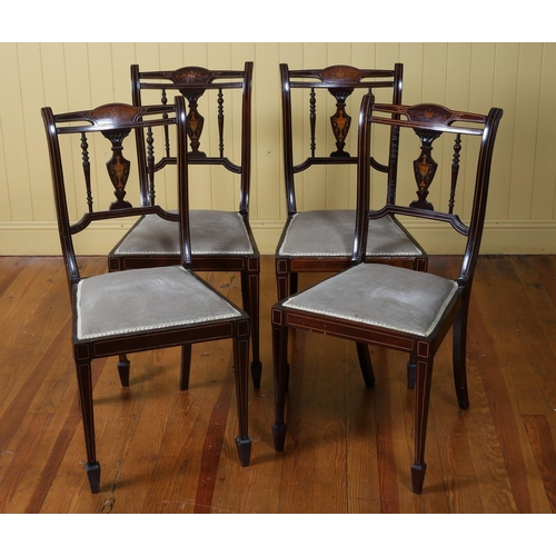 13 - A SET OF FOUR EDWARDIAN MAHOGANY AND SATINWOOD INLAID SIDE CHAIRS each with a shield shaped splats a... 