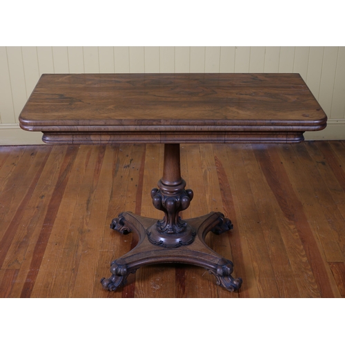 14 - A 19TH CENTURY ROSEWOOD FOLDOVER SUPPER TABLE the rectangular hinged top above a cylindrical and bul... 