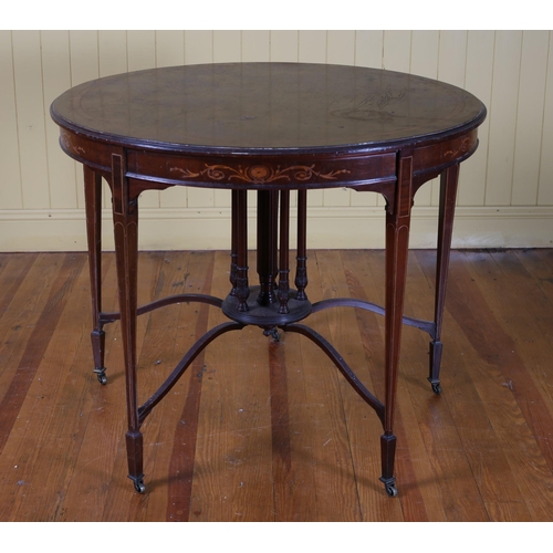 17 - AN EDWARDIAN MAHOGANY AND SATINWOOD INLAID OCCASIONAL TABLE the circular moulded top on square taper... 