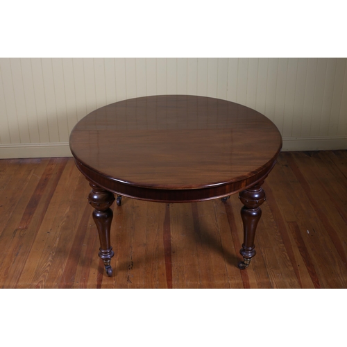 183 - A 19TH CENTURY MAHOGANY TELESCOPIC DINING TABLE of oval outline the shaped top with one loose leaf o... 