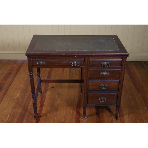 184 - AN EDWARDIAN MAHOGANY SINGLE PEDESTAL DESK the rectangular top with rexine writing surface above a f... 